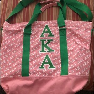 AKA bag with handles and a strap